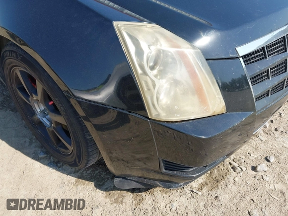 2009 Cadillac CTS RWD w/1SA with VIN 1G6DF577390128796, listed as a IAAI auction lot 42078153 with 257,757 mi miles. Bid and sale history available at carsss.com. Image 6.