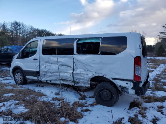 2023 Ford Transit Passenger Wagon XL with VIN 1FBAX2YG7PKA45212, listed as a Copart auction lot 42914795 with 70,987 mi miles and Salvage Title. Bid and sale history available at carsss.com. Image 2.