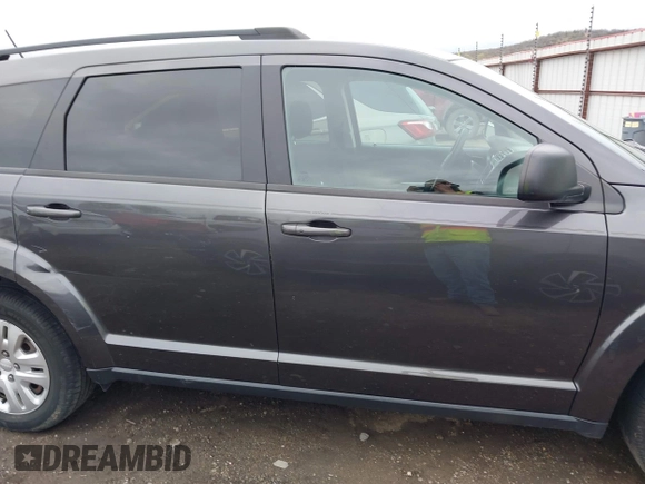 2017 Dodge Journey SE with VIN 3C4PDCAB9HT603595, listed as a IAAI auction lot 41914690 with 104,960 mi miles and . Bid and sale history available at DreamBid. Image 13.