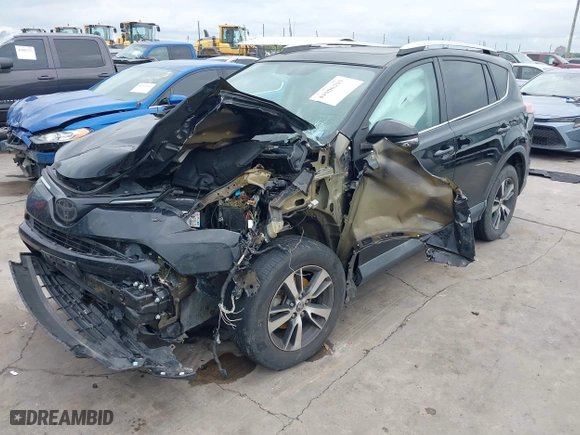 2016 Toyota RAV4 XLE with VIN 2T3WFREV9GW276278, listed as a IAAI auction lot 41906293 with 112,000 mi miles. Bid and sale history available at carsss.com. Image 2.