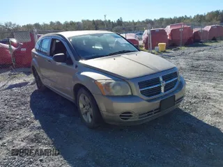 2010 Dodge Caliber SXT with VIN 1B3CB4HA4AD613312, listed as a IAAI auction lot 41746603 with 180,606 mi miles and . Bid and sale history available at DreamBid. Image 1.
