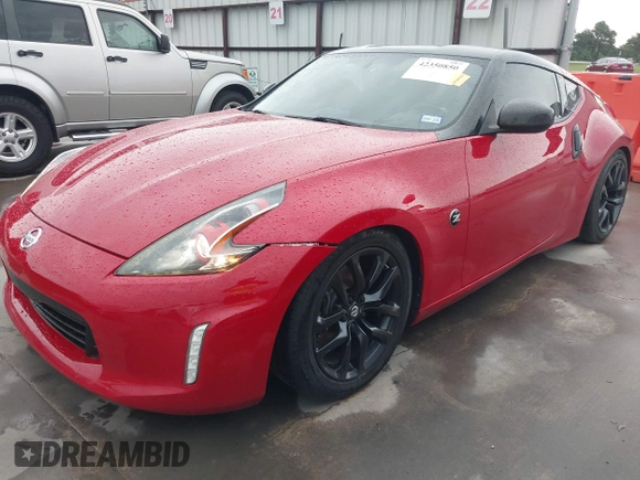 2016 Nissan 370Z z VIN JN1AZ4EHXGM932681, wystawiony jako IAAI lot #42350850 z przebiegiem 94 586 mil mil oraz . Historia ofert i sprzedaży dostępna na DreamBid. Obrazek 17.