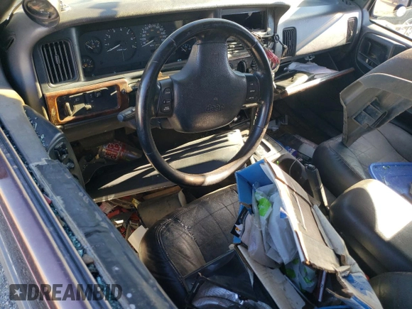 1997 Jeep Grand Cherokee Laredo with VIN 1J4GZ58Y3VC653093, listed as a Copart auction lot 79576964 with 0 mi miles and Salvage Title. Bid and sale history available at carsss.com. Image 8.