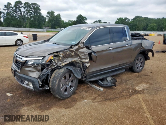 2020 Honda Ridgeline RTL-E with VIN 5FPYK3F79LB001891, listed as a Copart auction lot 58569255 with 34,513 mi miles and Salvage title. Bid and sale history available at DreamBid. Image 1.
