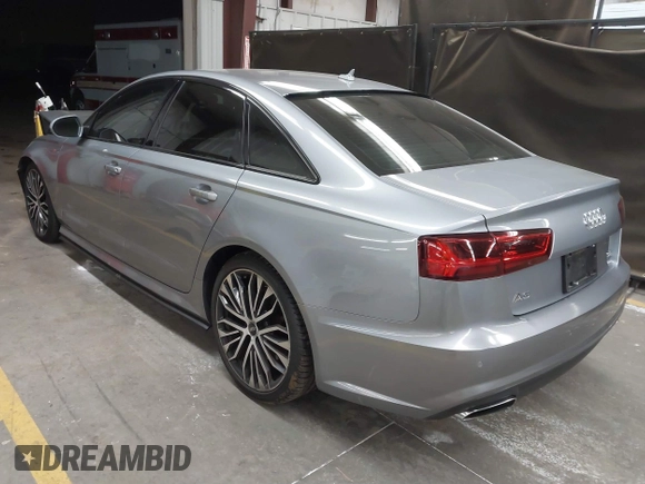 2017 Audi A6 Premium Plus z VIN WAUF2AFC9HN128728, wystawiony jako IAAI lot #41699063 z przebiegiem 110 475 mil mil oraz . Historia ofert i sprzedaży dostępna na DreamBid. Obrazek 3.