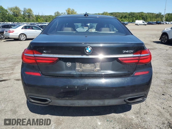 2017 BMW 7 Series 740i xDrive with VIN WBA7E4C54HGU99710, listed as a Copart auction lot 69572544 with 0 mi miles and Salvage Title. Bid and sale history available at carsss.com. Image 6.