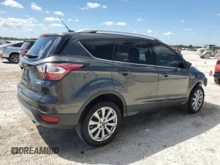 2017 Ford Escape Titanium with VIN 1FMCU0J95HUF02694, listed as a Copart auction lot 49861745 with 114,602 mi miles and Salvage Title. Bid and sale history available at DreamBid. Image 3.