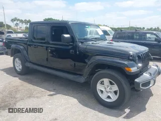 2022 Jeep Gladiator Willys Sport z VIN 1C6HJTAG7NL161701, wystawiony jako IAAI lot #42097144 z przebiegiem 32 989 mil mil oraz . Historia ofert i sprzedaży dostępna na DreamBid. Obrazek 1.