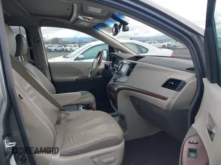2011 Toyota Sienna XLE with VIN 5TDDK3DCXBS003666, listed as a IAAI auction lot 41807992 with 156,699 mi miles. Bid and sale history available at carsss.com. Image 5.