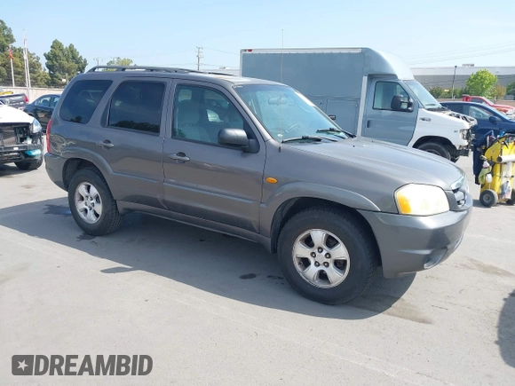 2003 Mazda Tribute LX with VIN 4F2YZ04193KM08890, listed as a IAAI auction lot 42158385 with 282,314 mi miles and . Bid and sale history available at carsss.com. Image 1.