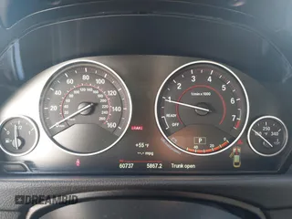 2015 BMW 4 Series 428i with VIN WBA4A5C58FG051293, listed as a IAAI auction lot 41255541 with 60,737 mi miles and . Bid and sale history available at DreamBid. Image 7.