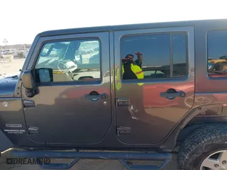 2017 Jeep Wrangler Unlimited Sport with VIN 1C4BJWDG4HL634468, listed as a IAAI auction lot 41668747 with 88,691 mi miles. Bid and sale history available at carsss.com. Image 14.