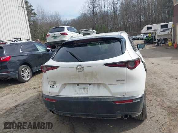 2021 Mazda CX-30 Premium with VIN 3MVDMBDM8MM216520, listed as a IAAI auction lot 41848596 with 60,353 mi miles and . Bid and sale history available at DreamBid. Image 16.