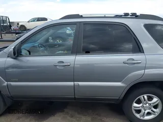 2005 Kia Sportage LX with VIN KNDJE723257122055, listed as a IAAI auction lot 42192102 with 167,726 mi miles and . Bid and sale history available at carsss.com. Image 14.