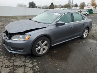 2012 Volkswagen Passat SE with VIN 1VWBP7A3XCC040866, listed as a Copart auction lot 82473374 with 157,391 mi miles and Salvage Title. Bid and sale history available at carsss.com. Image 1.
