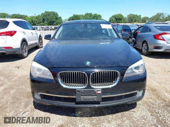 2012 BMW 7 Series 750i with VIN WBAKA8C50CCY37892, listed as a IAAI auction lot 42080313 with 148,058 mi miles. Bid and sale history available at carsss.com. Image 6.