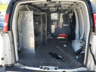 2013 Chevrolet Express Cargo with VIN 1GCSGAFX6D1137958, listed as a IAAI auction lot 42650988 with 66,975 mi miles and . Bid and sale history available at DreamBid. Image 5.