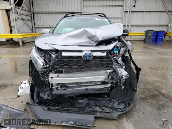 2024 Toyota RAV4 Hybrid XLE Premium with VIN 4T3B6RFV9RU167402, listed as a Copart auction lot 89083875 with 5,923 mi miles and Salvage Title. Bid and sale history available at DreamBid. Image 5.