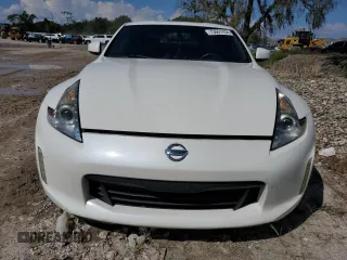 2014 Nissan 370Z Touring with VIN JN1AZ4EH0EM636520, listed as a Copart auction lot 73661434 with 0 mi miles and Salvage Title. Bid and sale history available at carsss.com. Image 5.