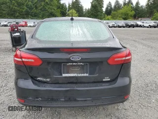 2018 Ford Focus SE z VIN 1FADP3FEXJL288116, wystawiony jako Copart lot #59629655 z przebiegiem 105 461 mil mil oraz Czysty tytuł • Clean title. Historia ofert i sprzedaży dostępna na DreamBid. Obrazek 6.