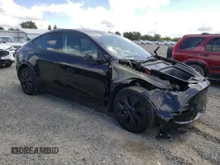 2024 Tesla Model Y Long Range с VIN 7SAYGAEE6RF127846, выставлен на аукционе Copart как лот 56968035 с пробегом 23 328 миль миль и Списание • Salvage title. История ставок и продаж доступна на DreamBid. Изображение 4.