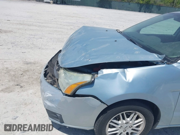 2009 Ford Focus SE with VIN 1FAHP35N19W232918, listed as a IAAI auction lot 42076066 with 165,953 mi miles. Bid and sale history available at carsss.com. Image 6.