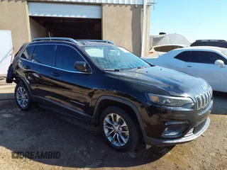 2019 Jeep Cherokee Latitude Plus with VIN 1C4PJLLB3KD223431, listed as a IAAI auction lot 40377530 with 123,575 mi miles. Bid and sale history available at carsss.com. Image 1.