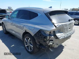 2025 Genesis GV80 z VIN KMUHBESB6SU220535, wystawiony jako IAAI lot #41967009 z przebiegiem 18 484 mil mil oraz . Historia ofert i sprzedaży dostępna na DreamBid. Obrazek 3.