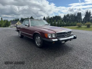 1985 Mercedes-Benz 380 z VIN WDBBA45CXFA031970, wystawiony jako Copart lot #57814665 z przebiegiem 115 038 mil mil oraz Tytuł czysty. Historia ofert i sprzedaży dostępna na DreamBid. Obrazek 1.