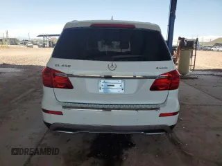 2014 Mercedes-Benz GL 450 with VIN 4JGDF7CE0EA353173, listed as a Copart auction lot 60428895 with 126,486 mi miles and Salvage title. Bid and sale history available at DreamBid. Image 6.