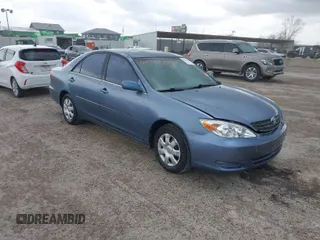 2002 Toyota Camry LE z VIN 4T1BE32K72U539409, wystawiony jako IAAI lot #41874551 z przebiegiem 126 402 mil mil oraz . Historia ofert i sprzedaży dostępna na DreamBid. Obrazek 1.