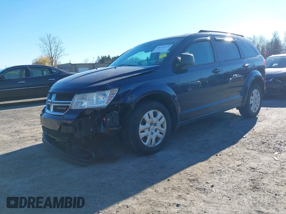 2017 Dodge Journey SE with VIN 3C4PDCAB4HT582865, listed as a IAAI auction lot 38132313 with 142,613 mi miles and . Bid and sale history available at DreamBid. Image 2.