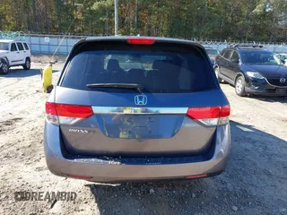 2016 Honda Odyssey EX-L with VIN 5FNRL5H69GB047902, listed as a IAAI auction lot 40795564 with 124,788 mi miles. Bid and sale history available at carsss.com. Image 16.