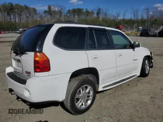 2007 GMC Envoy Denali with VIN 1GKET63MX72296808, listed as a Copart auction lot 50566995 with 173,244 mi miles and Salvage Title. Bid and sale history available at carsss.com. Image 3.