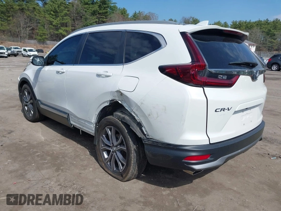 2020 Honda CR-V Touring z VIN 2HKRW2H9XLH623380, wystawiony jako IAAI lot #42039028 z przebiegiem 59 795 mil mil oraz . Historia ofert i sprzedaży dostępna na DreamBid. Obrazek 3.
