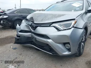 2018 Toyota RAV4 XLE with VIN JTMWFREV7JJ203609, listed as a IAAI auction lot 41938100 with 51,021 mi miles. Bid and sale history available at carsss.com. Image 6.