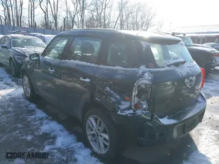 2013 MINI Cooper Countryman with VIN WMWZB3C53DWM08700, listed as a IAAI auction lot 41402093 with 71,109 mi miles. Bid and sale history available at carsss.com. Image 3.
