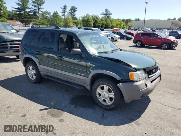 2002 Ford Escape XLT Choice with VIN 1FMCU04172KD00268, listed as a Copart auction lot 61284675 with 118,016 mi miles and Salvage title. Bid and sale history available at DreamBid. Image 4.