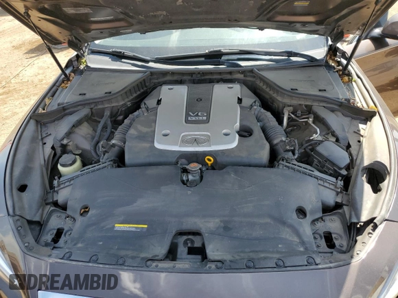 2015 Infiniti Q50 Premium с VIN JN1BV7AR7FM421900, выставлен на аукционе Copart как лот 58426305 с пробегом 125 467 миль миль и Списание • Salvage title. История ставок и продаж доступна на DreamBid. Изображение 11.