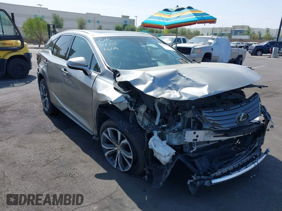 2017 Lexus RX 350 z VIN 2T2ZZMCA3HC041664, wystawiony jako IAAI lot #42379331 z przebiegiem 153 887 mil mil oraz . Historia ofert i sprzedaży dostępna na DreamBid. Obrazek 1.
