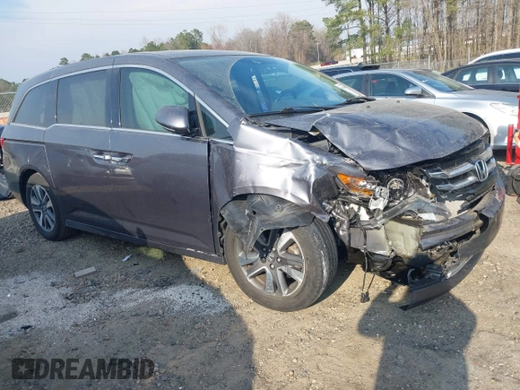 2016 Honda Odyssey Touring Elite with VIN 5FNRL5H92GB018560, listed as a IAAI auction lot 41796605 with 83,234 mi miles and . Bid and sale history available at carsss.com. Image 1.