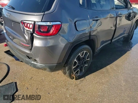 2021 Jeep Compass Trailhawk with VIN 3C4NJDDB3MT564983, listed as a Copart auction lot 76310514 with 77,585 mi miles and Non repairable. Bid and sale history available at DreamBid. Image 14.