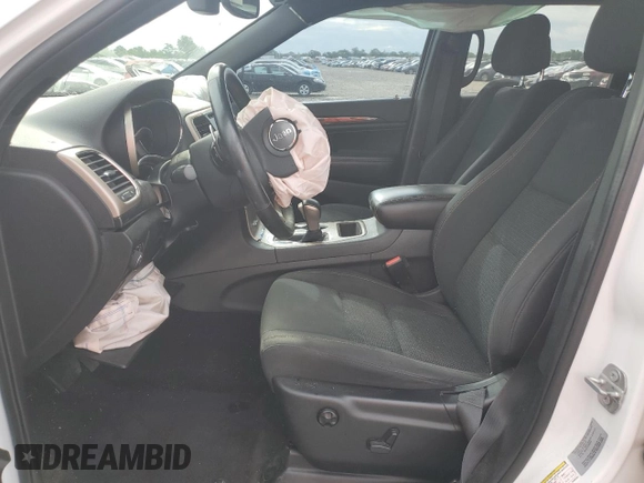 2017 Jeep Grand Cherokee 75th Anniversary with VIN 1C4RJEAG3HC696232, listed as a Copart auction lot 57362055 with 105,440 mi miles and Salvage title. Bid and sale history available at DreamBid. Image 7.