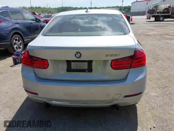 2013 BMW 3 Series 335i with VIN WBA3A9C55DF475648, listed as a IAAI auction lot 42310502 with 151,823 mi miles and . Bid and sale history available at DreamBid. Image 16.
