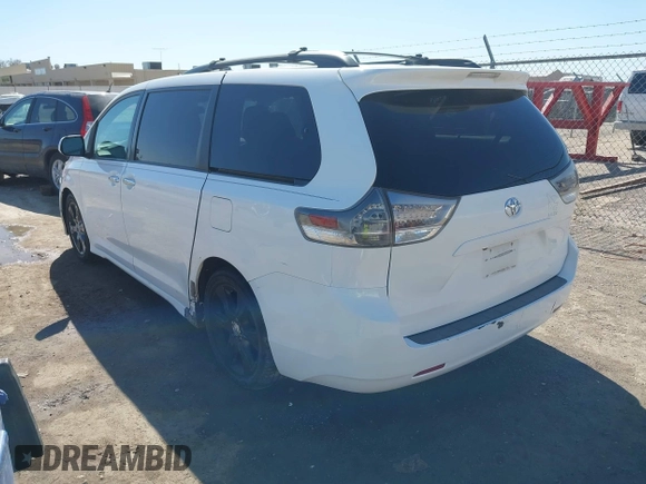 2014 Toyota Sienna SE with VIN 5TDXK3DC0ES477207, listed as a IAAI auction lot 41624619 with 213,881 mi miles and . Bid and sale history available at DreamBid. Image 3.