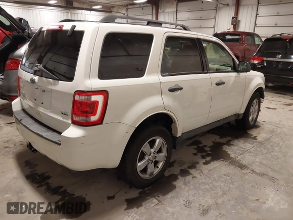 2012 Ford Escape XLT z VIN 1FMCU9DG4CKA72675, wystawiony jako IAAI lot #41212739 z przebiegiem 112 781 mil mil oraz . Historia ofert i sprzedaży dostępna na DreamBid. Obrazek 4.