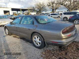 1999 Oldsmobile Aurora with VIN 1G3GR62C8X4116452, listed as a Copart auction lot 84070784 with 92,526 mi miles and Non Repairable. Bid and sale history available at DreamBid. Image 2.