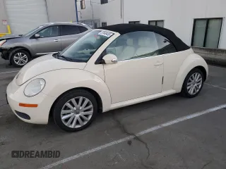 2009 Volkswagen Beetle S with VIN 3VWRF31Y29M409328, listed as a Copart auction lot 87849455 with 69,693 mi miles and Salvage Title. Bid and sale history available at DreamBid. Image 1.
