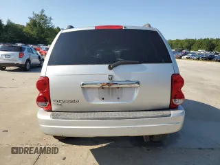 2004 Dodge Durango SLT z VIN 1D4HD48N94F193222, wystawiony jako Copart lot #67905294 z przebiegiem 293 754 mil mil oraz Szkoda całkowita • Salvage title. Historia ofert i sprzedaży dostępna na DreamBid. Obrazek 6.