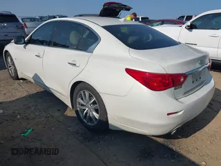 2015 Infiniti Q50 Premium z VIN JN1BV7AP5FM333958, wystawiony jako IAAI lot #42351044 z przebiegiem 158 428 mil mil oraz . Historia ofert i sprzedaży dostępna na DreamBid. Obrazek 3.